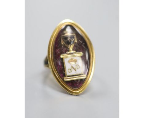   A George III yellow metal and three colour enamel navette shaped mourning ring, with Ducal coronet above 'N' on a pedestal 