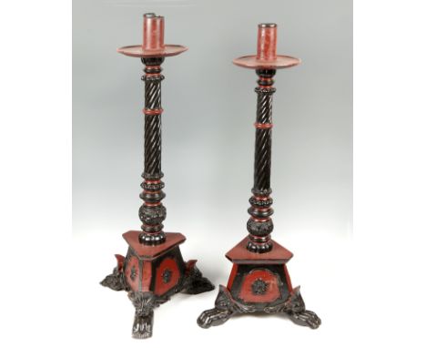 Pair of liturgical torchbearers; Vietnam, 19th century.Carved and lacquered wood.Measurements: 91 x 38 x 38 cm and 94 x 38 x 