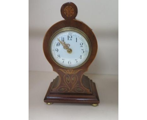 An 8 day walnut case with floral inlay French movement mantle clock, 26cm tall, in running order 