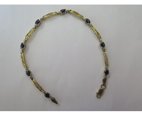 A 10ct yellow gold sapphire bracelet, 18cm long, approx 3.4 grams, in good condition 