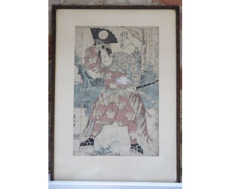 A framed Japanese print with label verso By Utagawa Toyoshige (=Toyokuni II) frame size 48cm x 34cm, some creasing and staini