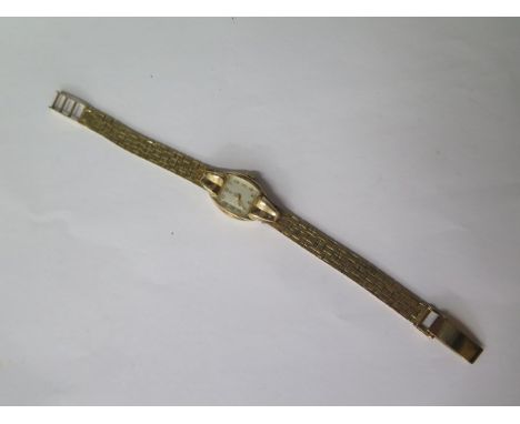 A 9ct yellow gold ladies Tudor by Rolex manual wind bracelet watch, 15mm case, strap 18.5cm long, total weight approx 27 gram