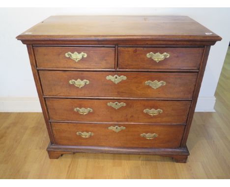 An 18th century line inlaid walnut 5 drawer chest with panelled sides and back on shaped bracket feet, 93cm tall x 102cm x 54