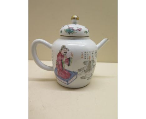 A famille rose Oriental teapot, 12cm tall, some wear to gilt, small chip to spout otherwise generally good 