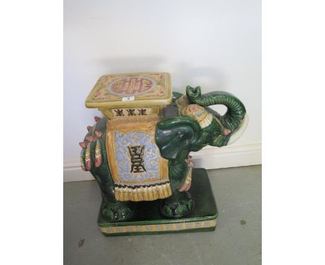 A Chinese ceramic Elephant garden stool, 55cm tall x 55cm long, minor chips to base otherwise generally good 