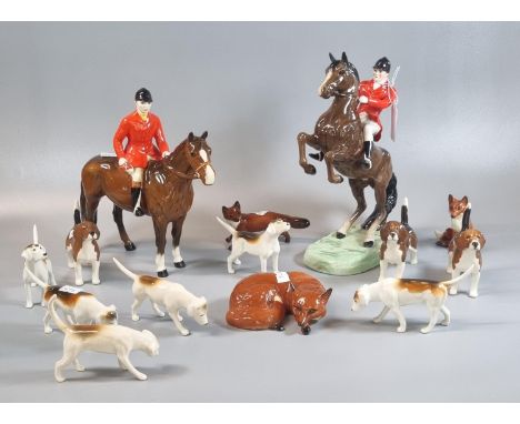 Beswick hunting group, to include: 868 horse and huntsman, another horse and seated huntsman, hounds ,beagles and three vario