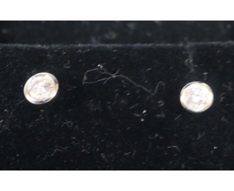 9ct gold diamond pair of stud earrings. 1g approx. (B.P. 21% + VAT)