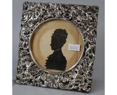 Art Nouveau easel silver picture frame embossed with cherubs and silhouette of a Victorian lady. (B.P. 21% + VAT)   No repair