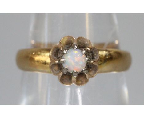 Yellow metal opal ring, size K, 2.6g approx.  (B.P. 21% + VAT) 