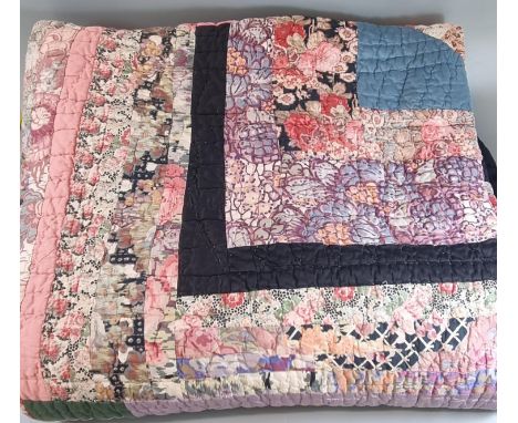 Handmade antique cotton double sided patchwork quilt with diamond centre. 200 x 211cm approx.(B.P. 21% + VAT) Wear to edges w