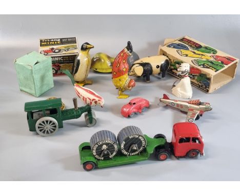 Collection of mainly tin plate toys, to include: clockwork animals, Tri-ang Minic farm tractor with trailer in original box, 