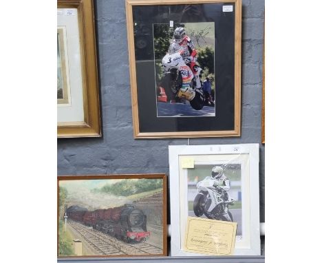 John McGuiness (Multiple T T Winner), coloured photograph, signed dated 2008, together with another James Toseland former wor