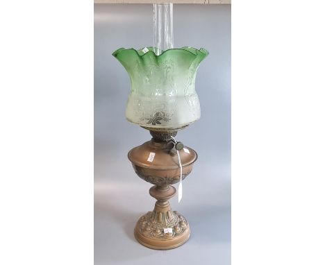 Early 20th century double burner oil lamp having frosted green glass shade on a copper reservoir and base. (B.P. 21% + VAT)  