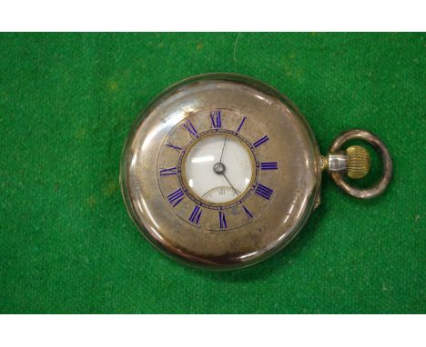 A gentlemen's silver half hunter pocket watch.