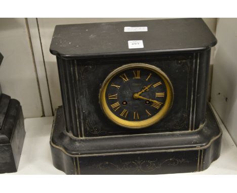 A slate mantel clock.