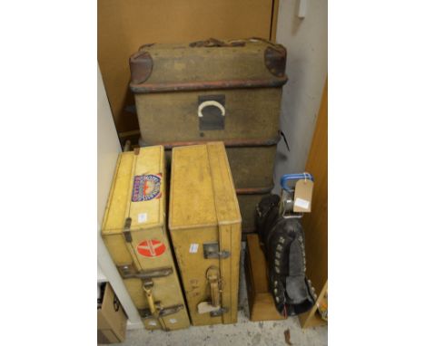 Two vellum suitcases, a pair of ski boots and an old trunk etc.