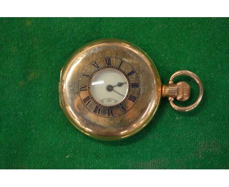 A gentlemen's gold plated half hunter pocket watch.