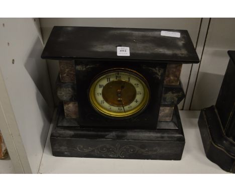 A slate mantel clock.