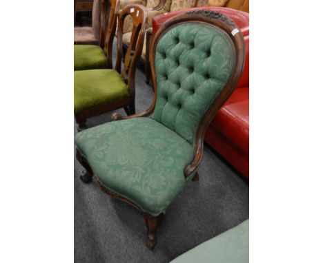 A Victorian button upholstered nursing chair.