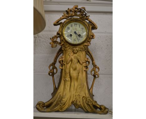 An Art Nouveau mantel clock.