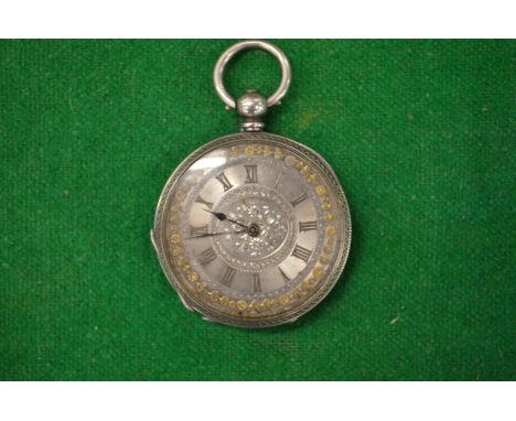 A ladies' silver pocket watch with engraved dial.