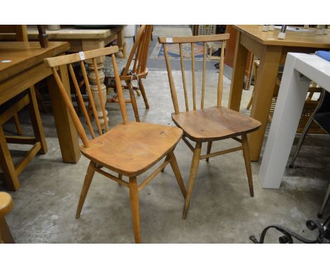 A pair of Ercol kitchen chairs.