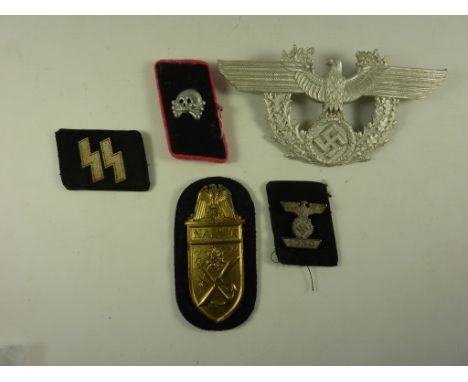 German Third Reich Narvik armshield, gold coloured metal with blue Kriegsmarine back plate, Third Reich helmet plate and othe