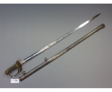 Victorian officer's sword, engraved 82cm blade by C Wallis Eton, brass hilt with shagreen grip and steel scabbard