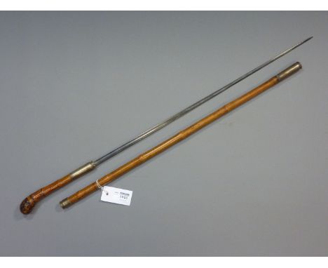 Edwardian Bamboo Swordstick, 62cm single edge fullered blade, the ferule and fittings fashioned out of nickel plated cartridg