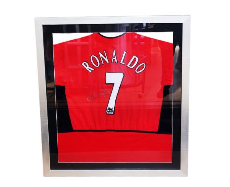 Manchester United: A framed and glazed, signed Manchester United 2003-04 home shirt, signed by Cristiano Ronaldo, with 'Ronal