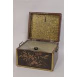 A JAPANESE LACQUERED AND GILDED WOODEN TOBACCO BOX, with mounted handles and pewter lined