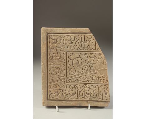 A RARE 12TH-13TH CENTURY PERSIAN SELJUK POSSIBLY HERAT OR KHORASSAN POTTERY MOULD, with fine calligraphy and spiral decoratio