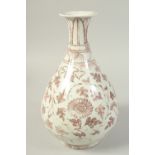 A CHINESE UNDERGLAZE PORCELAIN YUHUCHUN VASE, decorated with flower heads and vines, 33cm high.