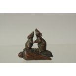 A BRONZE OKIMONO OF TWO RATS on a corn cob, 4cm high.