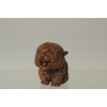 A BRONZE OKIMONO OF A STYLISED TIGER, 4cm high.