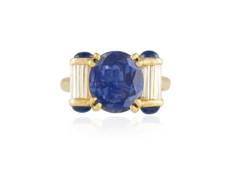 A SAPPHIRE AND DIAMOND DRESS RINGThe central oval-shaped sapphire weighing approximately 3.80cts between tubular shoulders se