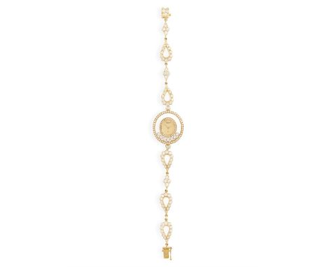 A LADY'S 18K GOLD AND DIAMOND 'HAPPY DIAMONDS' WATCH, BY CHOPARD4-jewel quartz ETA-movement 201001, oval-shaped champagne dia