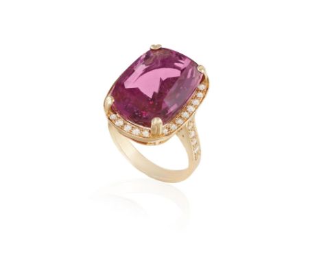 AN IMPORTANT SPINEL AND DIAMOND COCKTAIL RINGThe central elongated cushion-shaped spinel weighing 17.50cts within a four-claw