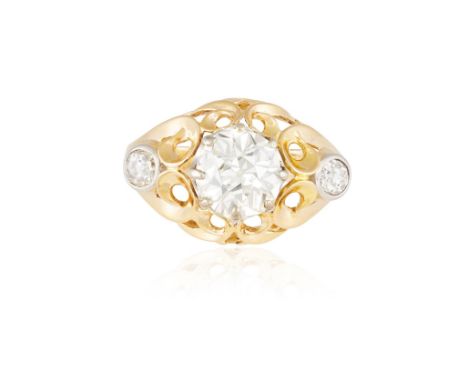 A DIAMOND SINGLE-STONE RING, CIRCA 1950Of openwork foliate design centring an old brilliant-cut diamond weighing approximatel