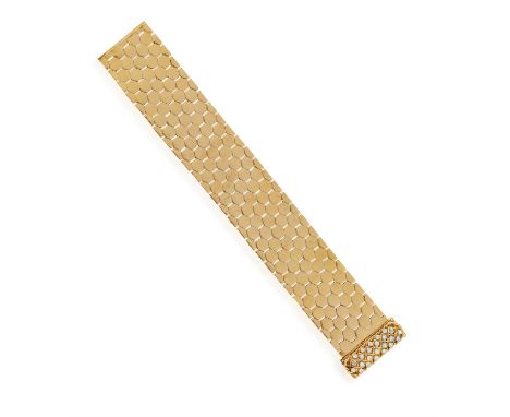 A DIAMOND JARRETIÈRE BRACELET, CIRCA 1940The highly flexible bracelet of honeycomb design, to a single-cut diamond clasp with