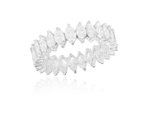 A DIAMOND ETERNITY RINGComposed of a continuous row of marquise-shaped diamonds within claw-setting, diamonds approximately 3
