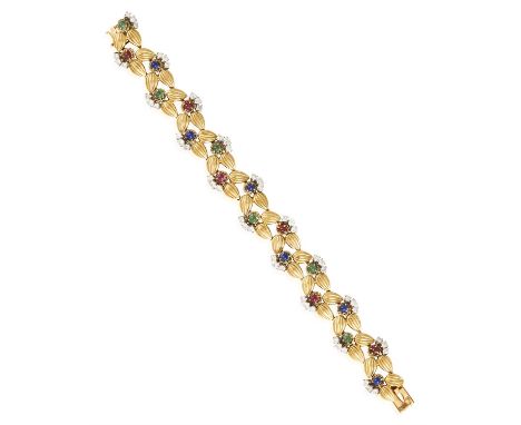 A GEM-SET AND DIAMOND BRACELET, BY BOUCHERON, CIRCA 1960Composed of fluted foliate links, highlighted with circular cabochon 