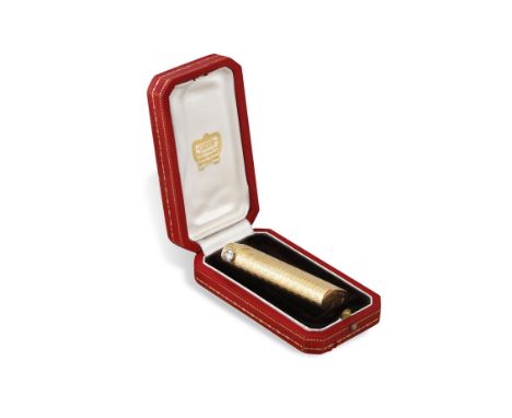 ***PLEASE NOTE THE DATE SHOULD READ CIRCA 1965***A DIAMOND-SET AND GOLD LIGHTER, BY CARTIER PARIS, CIRCA 1965The textured gol