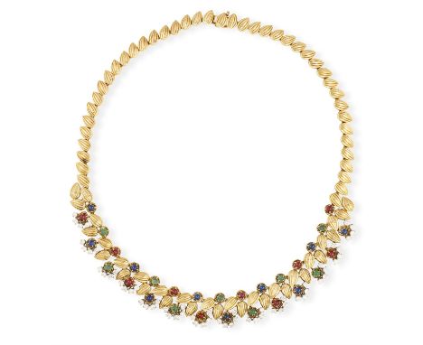 A GEM-SET AND DIAMOND NECKLACE, BY BOUCHERON, CIRCA 1960Composed of fluted foliate links, the frontispiece set with circular 