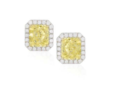 A PAIR OF COLOURED DIAMOND AND DIAMOND EARSTUDSEach cut-cornered rectangular yellow diamond within a four-claw setting, to a 