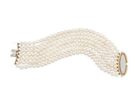 A CULTURED PEARL AND DIAMOND BRACELETComposed of seven rows of cultured pearls of cream tint measuring approximately 5.50mm, 
