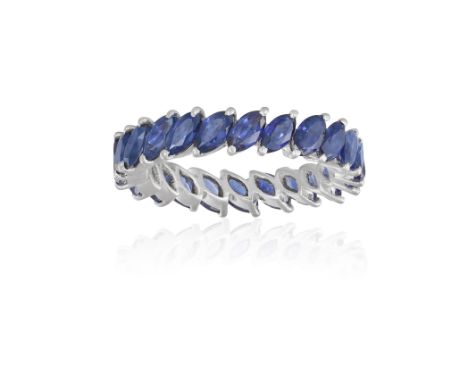 A SAPPHIRE ETERNITY RINGComposed of a continuous row of marquise-shaped sapphires within claw-setting, ring size LCondition R