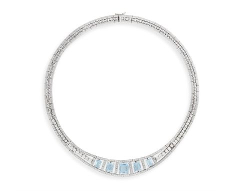 A TOPAZ AND DIAMOND NECKLACEThe frontispiece set with five graduated rectangular-cut blue topaz, within an openwork surround 