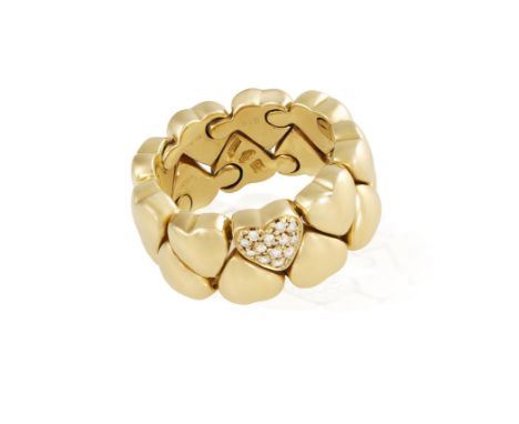 A DIAMOND RING, BY CARTIER, CIRCA 1995Composed of bombé heart-shaped links, one heart pavé-set with brilliant-cut diamonds, m