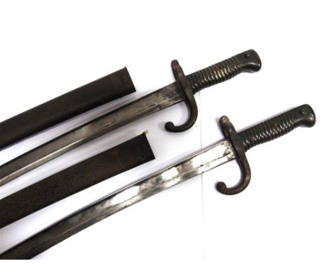 TWO FRENCH M1866 CHASSEPOT SWORD BAYONETS each with 57cm t-section steel blades, hooked quillons with ball finials, and brass